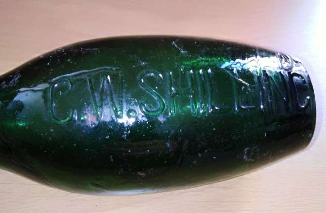 Antique Bottle:  Green C W Shilling, Pretoria. Trapped Air Bubbles