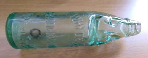 Collection of 4 Antique Bottles in Good Condition with Trapped Air Bubbles