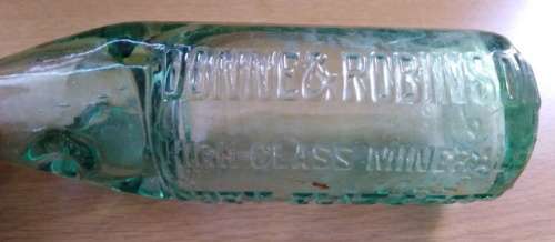 Collection of 4 Antique Bottles in Good Condition with Trapped Air Bubbles