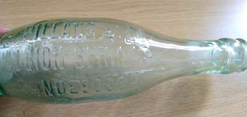 Collection of 4 Antique Bottles in Good Condition with Trapped Air Bubbles