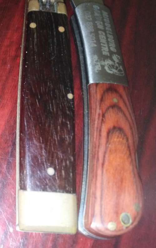 A Collection of 5 Folding Knives with Wooden Handles