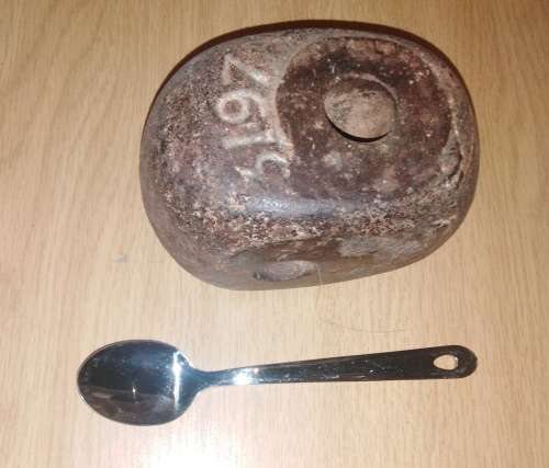 Four Vintage Slotted Scale Weights (measurements units in pounds) and one other weight