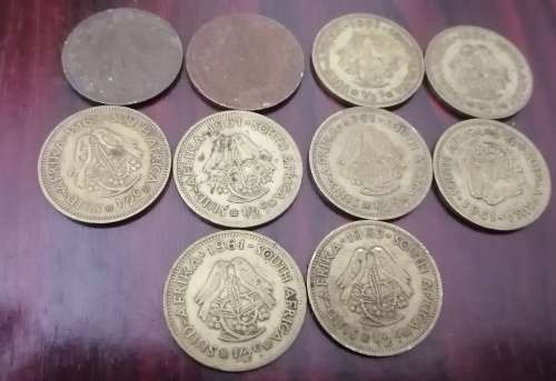 A Collection of notes from  Swaziland, Indonesia and coins from ZAR, SA and America