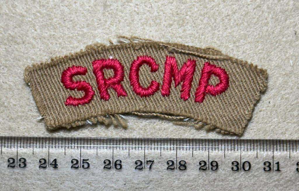 SRCMP Southern Rhodesia Corps of Military Police - SHOULDER TITLE CLOTH - Red on Sand Twill Backing
