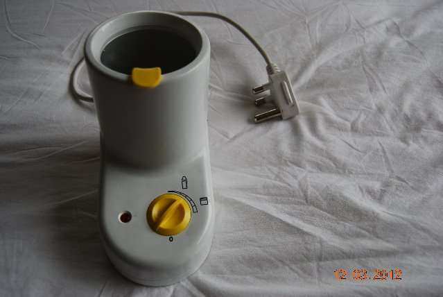 NEW BOTTLE WARMER USED FOR DISPLAY