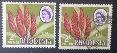 RHODESIA SACC 140-2 SHILLINGS X2 MH/USED WITH FLAW SHIFT OF FLOWER INTO MARGINS