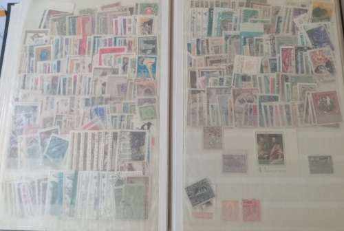 DAVO DEALERS ALBUM WITH STAMPS FROM RHODESIA/RUSSIA/RWANDA AND ROMANIA (#C12)