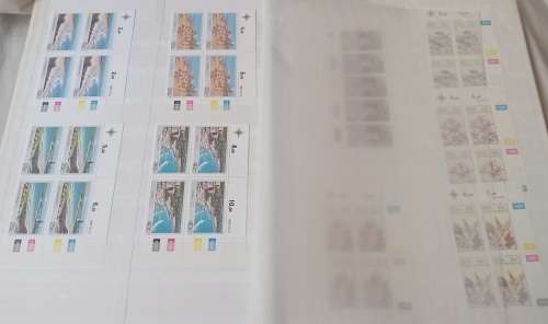 DAVO DEALERS ALBUM WITH STAMPS FROM RHODESIA/RUSSIA/RWANDA AND ROMANIA (#C12)