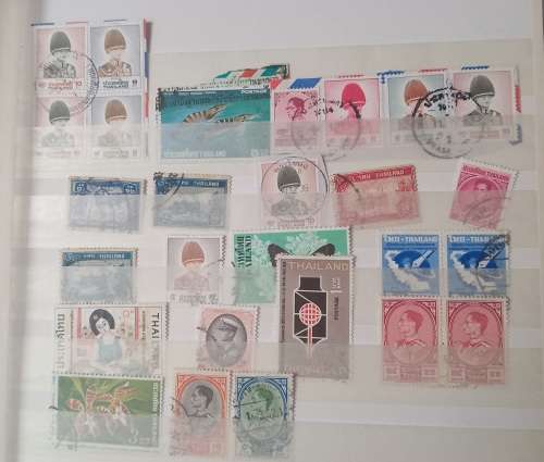 16 PAGESIDEAL STAMPS ALBUM WITH STAMPS FROM THESE COUNTRIES UAE/JAPAN`ROMANIA/LIBERIA/AJMAN/MACAU ,,