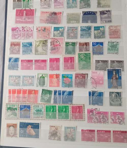 16 PAGESIDEAL STAMPS ALBUM WITH STAMPS FROM THESE COUNTRIES UAE/JAPAN`ROMANIA/LIBERIA/AJMAN/MACAU ,,