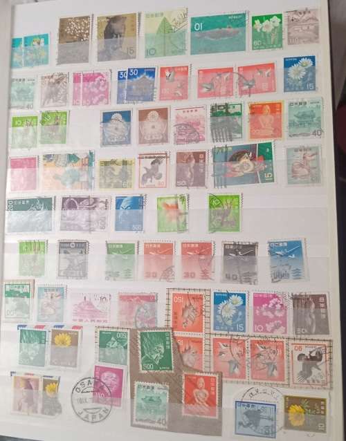 16 PAGESIDEAL STAMPS ALBUM WITH STAMPS FROM THESE COUNTRIES UAE/JAPAN`ROMANIA/LIBERIA/AJMAN/MACAU ,,