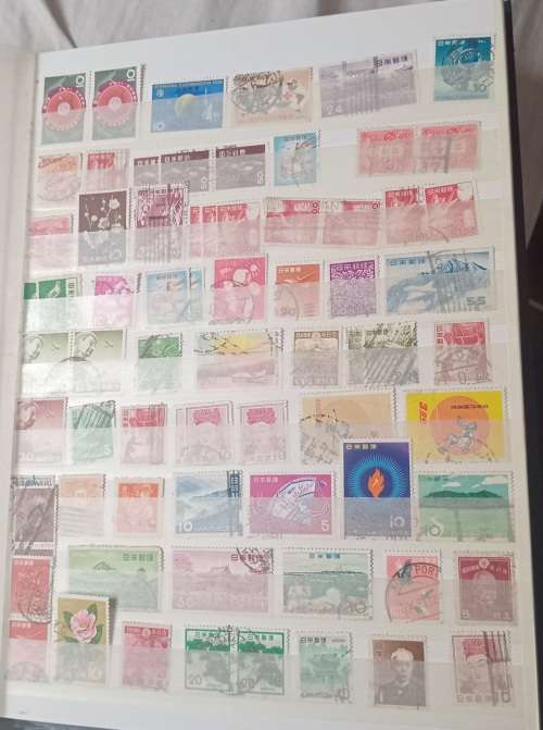16 PAGESIDEAL STAMPS ALBUM WITH STAMPS FROM THESE COUNTRIES UAE/JAPAN`ROMANIA/LIBERIA/AJMAN/MACAU ,,