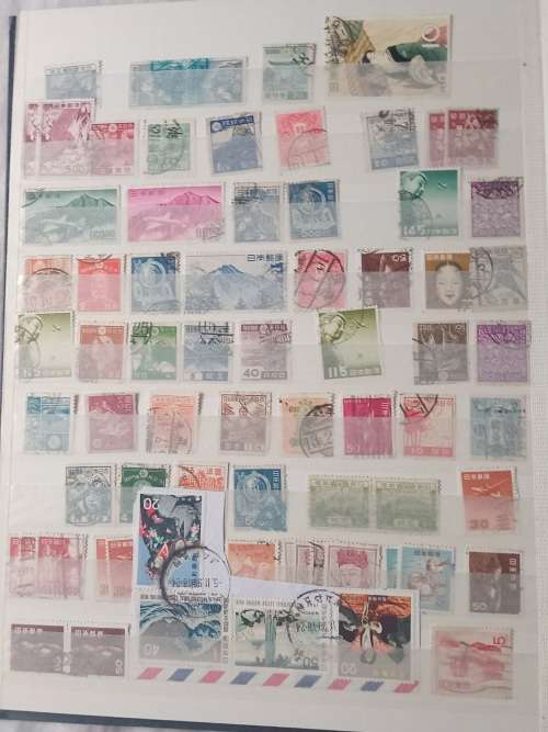 16 PAGESIDEAL STAMPS ALBUM WITH STAMPS FROM THESE COUNTRIES UAE/JAPAN`ROMANIA/LIBERIA/AJMAN/MACAU ,,