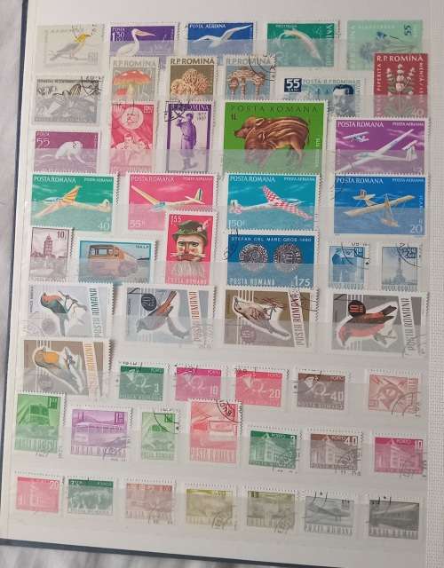 16 PAGESIDEAL STAMPS ALBUM WITH STAMPS FROM THESE COUNTRIES UAE/JAPAN`ROMANIA/LIBERIA/AJMAN/MACAU ,,
