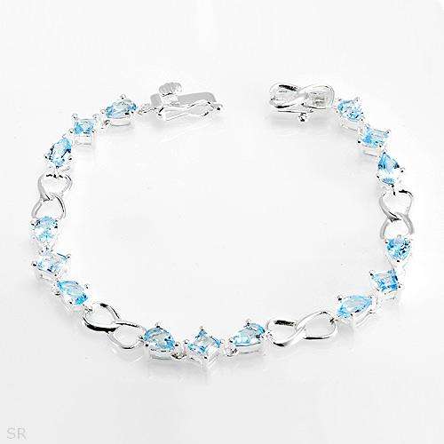 ****R2300****Bracelet with 7.00 CTW Genuine Topazes