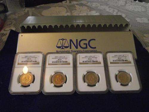 ## 4 Graded 90th B/Day Mandela Coins with NGC Box........A MUST HAVE !!!