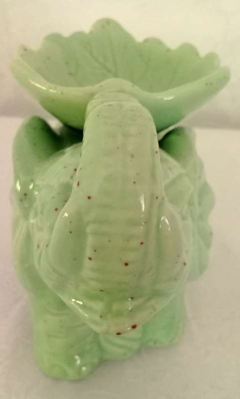 Pale green elephant tea light candle oil burner.