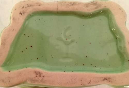 Pale green elephant tea light candle oil burner.