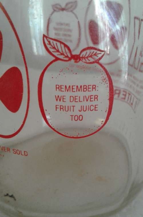 Two Old Clover Milk Bottles which were delivered in the 70's / 80's