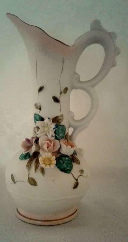 Delightful classical porcelain vase with floral bouquet