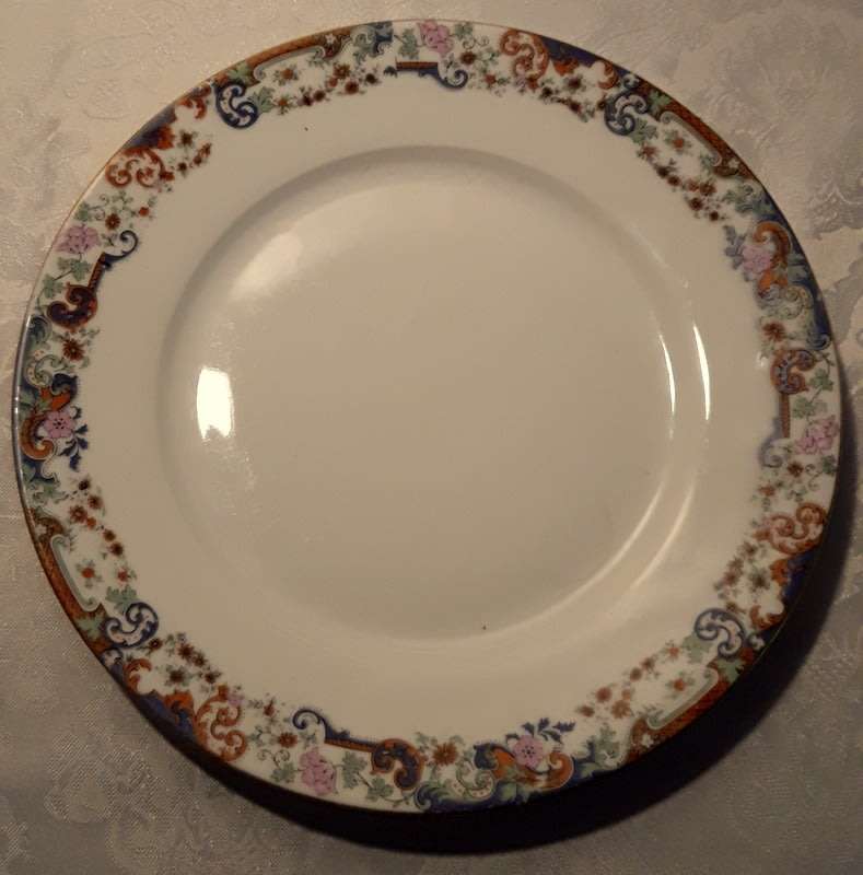 Vintage Limoges plate with a classical design