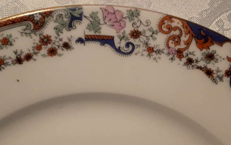 Vintage Limoges plate with a classical design