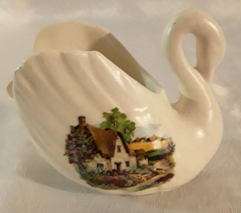 Pair of matching ornaments  English country Scene