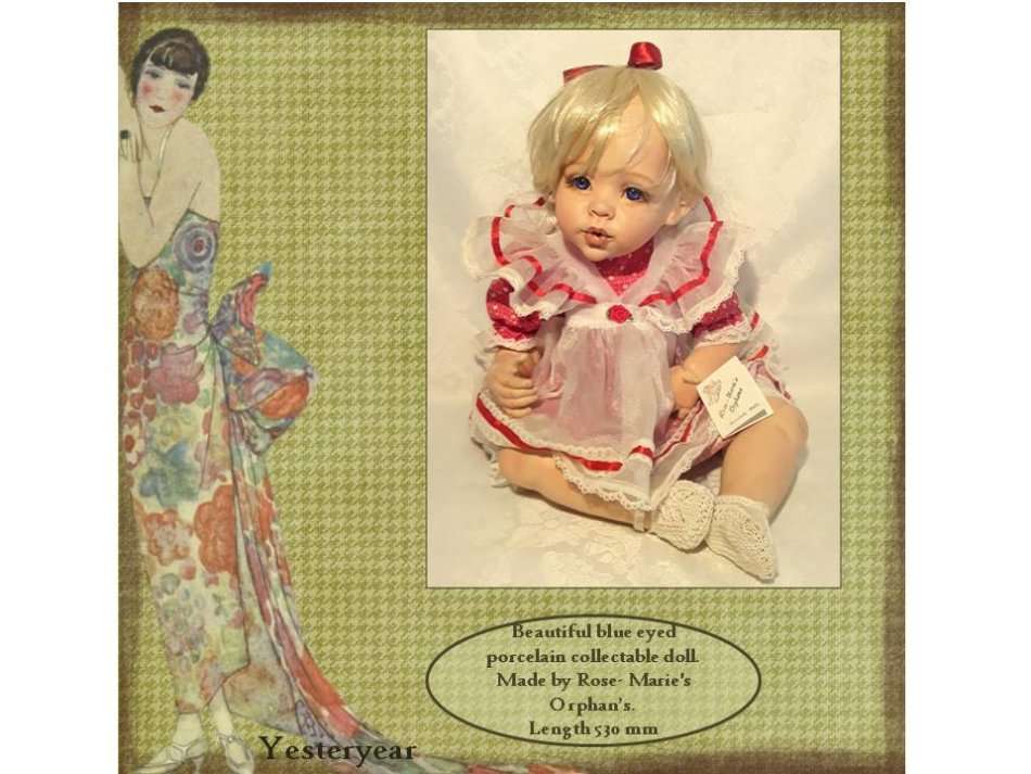 Beautiful porcelain collectable doll.  Made by Rose- Marie's Orphans.
