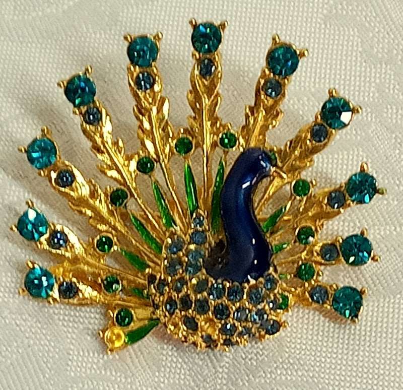 Bright vintage Peacock brooch