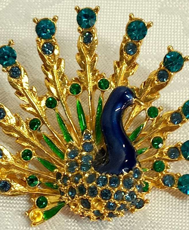 Bright vintage Peacock brooch