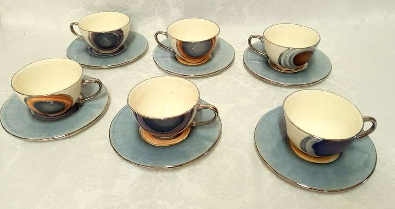 PotLIZ Hand Thrown, collectible ceramic pottery cups and saucers (six)