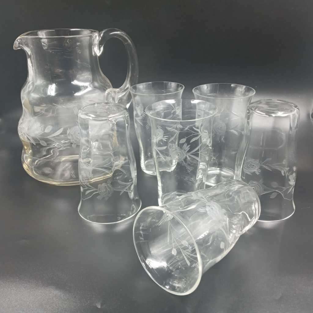 Vintage jug and six glasses. Rose cut design.