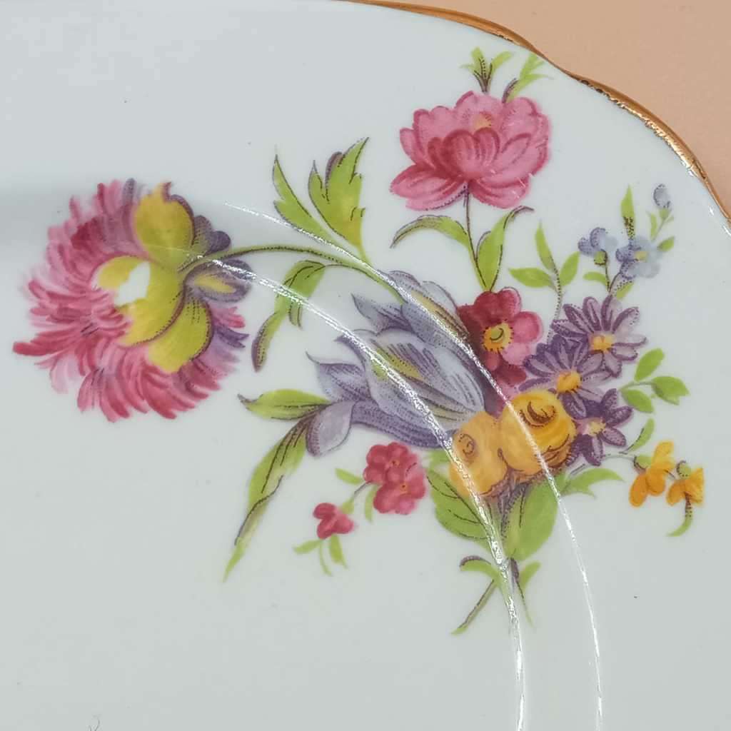 Two Sutherland Bone China side plates