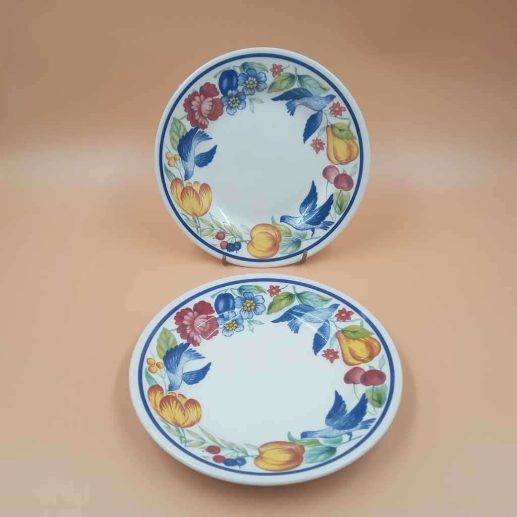 Two colourful Churchill side plates