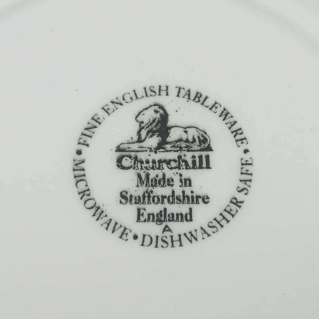 Two colourful Churchill side plates