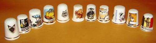 Set of 11 Different Porcelain Thumbels