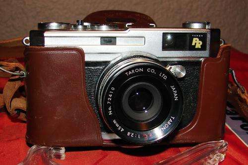 Vintage 1950`s Taron 35mm Automat Camera with leather case and manual