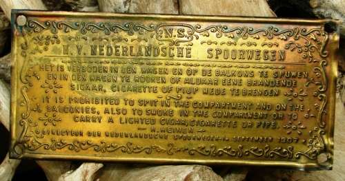 Antique brass/copper N.V. Nederlandsche Spoorwegen notice plague dated 1907