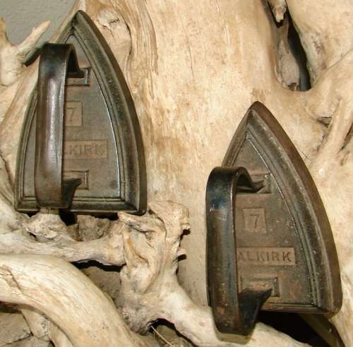 Pair of  vintage no 7 Falkirk cast iron Irons