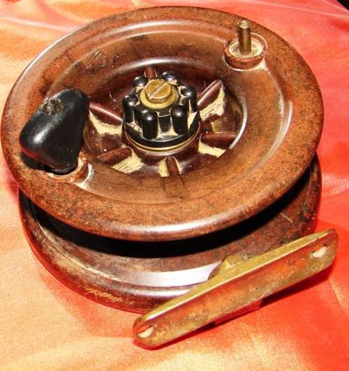 Vintage Tex Bakelite fishing reel with ratchet and drag-working condition
