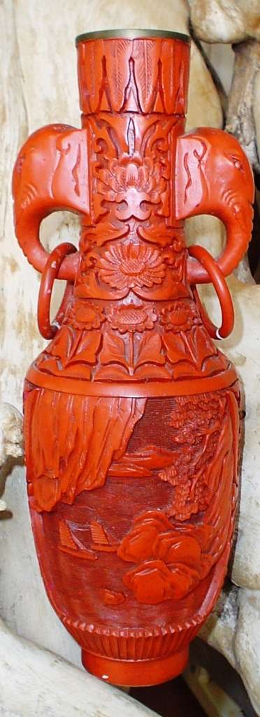 Beautiful vintage red Cinnabar carved vase with elephant handlles- detailed and highly collectible