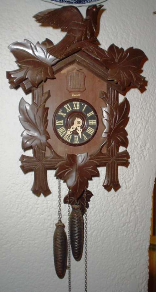 Genuine beautifull Cuckoo Wall Clock-made in Germany-complete and in working order-recently serviced