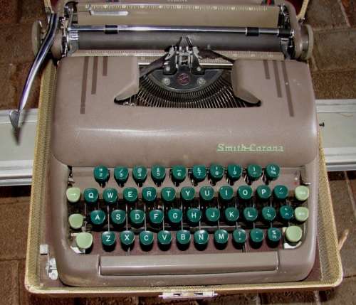 Antique late 1934`s Smith Corona Quite Type writer in original carry case