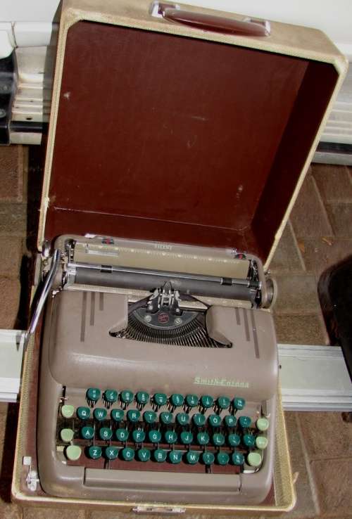 Antique late 1934`s Smith Corona Quite Type writer in original carry case
