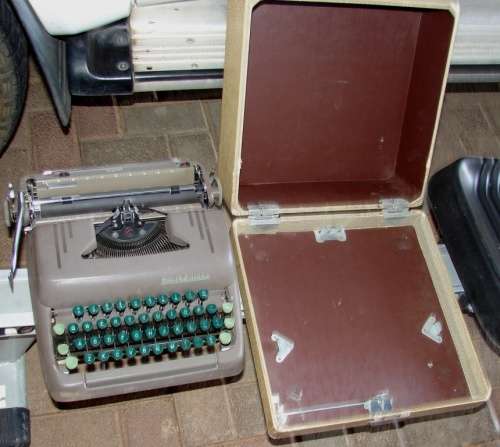 Antique late 1934`s Smith Corona Quite Type writer in original carry case