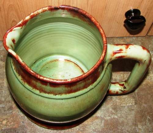 Beautiful green/brown spotted Linn Ware Jug-H 14 cm, Top dia.with handle 17 cm-small chip on rim
