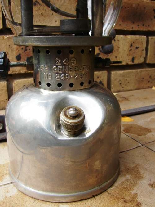 Green and silver Coleman Model 249- Made in Canada 05/1957 Kerosene lamp