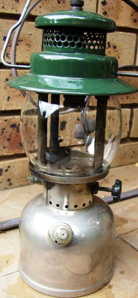 Green and silver Coleman Model 249- Made in Canada 05/1957 Kerosene lamp