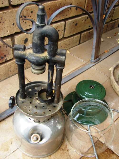 Green and silver Coleman Model 249- Made in Canada 05/1957 Kerosene lamp