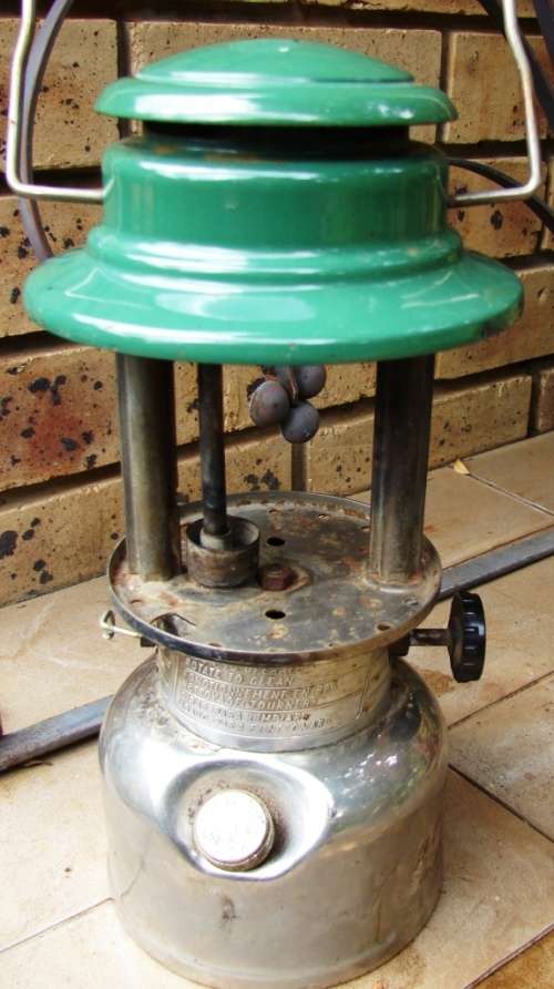 Green and silver Coleman Model 339- Made in Canada 01/1978 Kerosene lamp-no glass